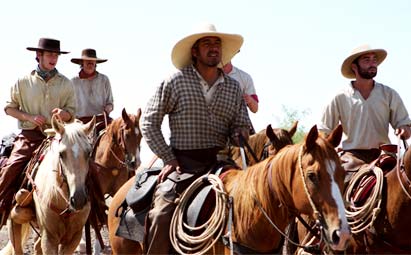 Cowboys, riding tall
