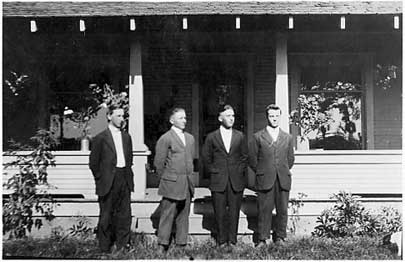 [photo of four young Mennonite boys]