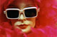 [Mannequin with hot pink feather boa]