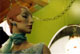 [Mannequin against green wall]