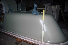 [photo of the bathtub in the garage, painted]