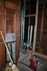[photo of the bathroom, with no wall!]