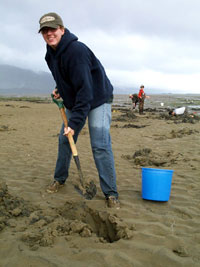 [photo of Kris digging a trench]
