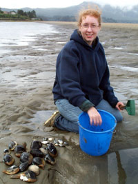 [photo of Kris with our limit of clams]