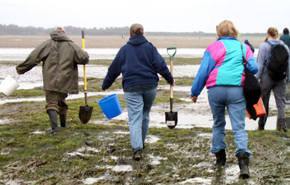 [photo of march across tidal flats]