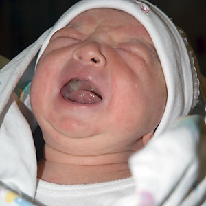 [photo of Isabel bawling]