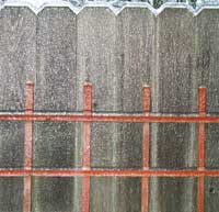 Ice on the fence -- this is how we know there's about an inch of it