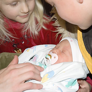 [photo of Emma holding Isabel]
