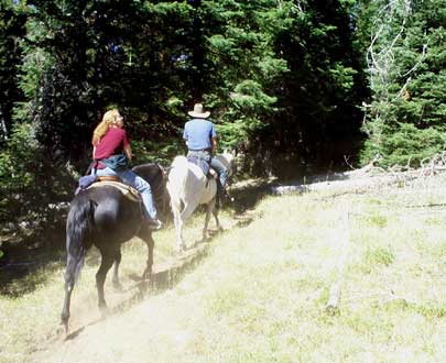 Kris (on Dakota) follows our guide, Marty -- yes, the ground is horribly overexposed