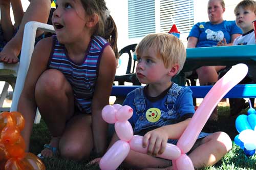 Courtney and Noah are impressed by the clowns